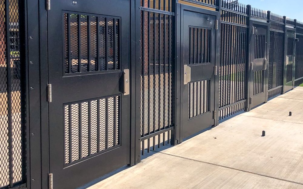 Industrial metal gate for panel fencing system